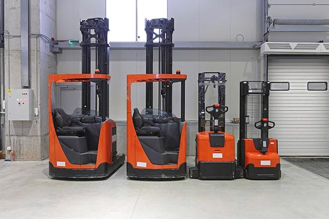 row of forklifts ready for use